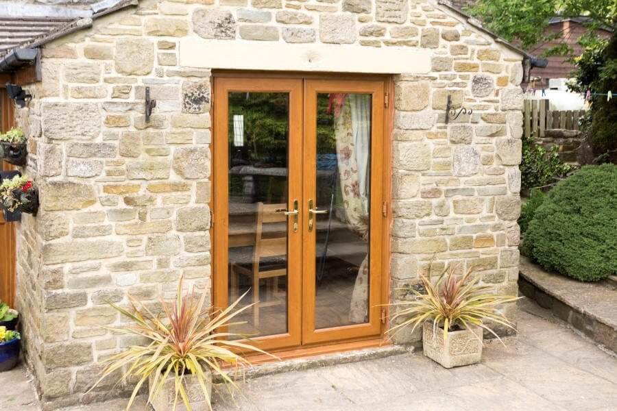 Stunning oak French doors making the most of the garden view